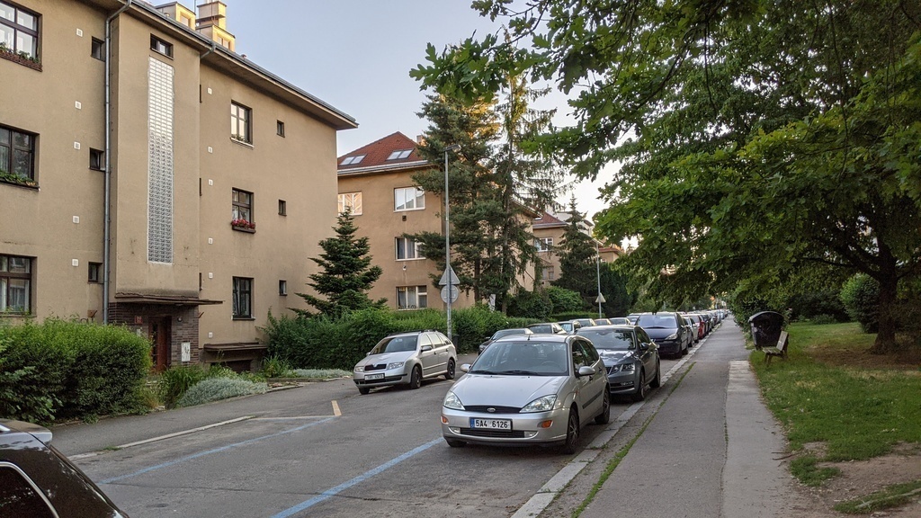 Outside of the house, blue line parking