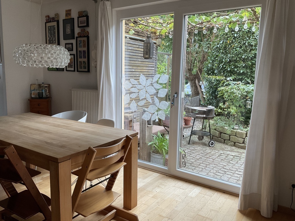 Dining area with view towards part of the garden (2023)