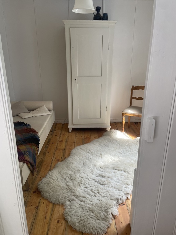 wooden cottage - small bedroom