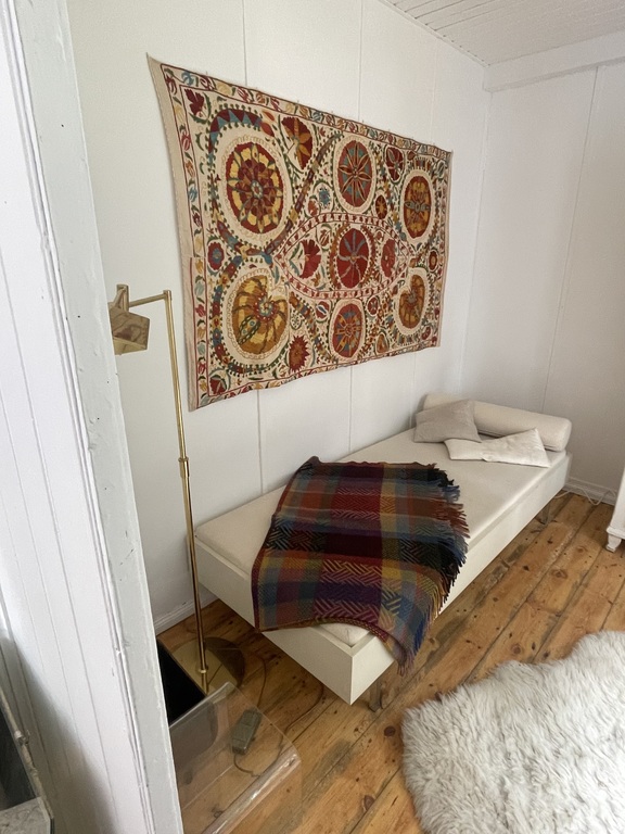 wooden cottage - small bedroom