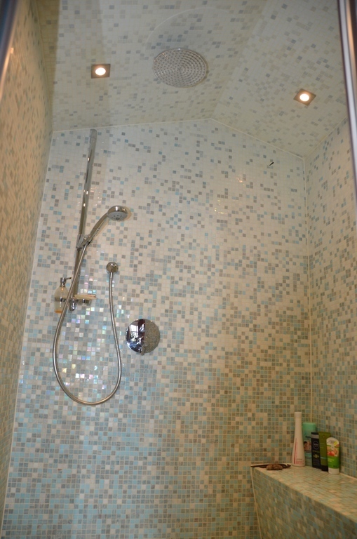 large shower with bench