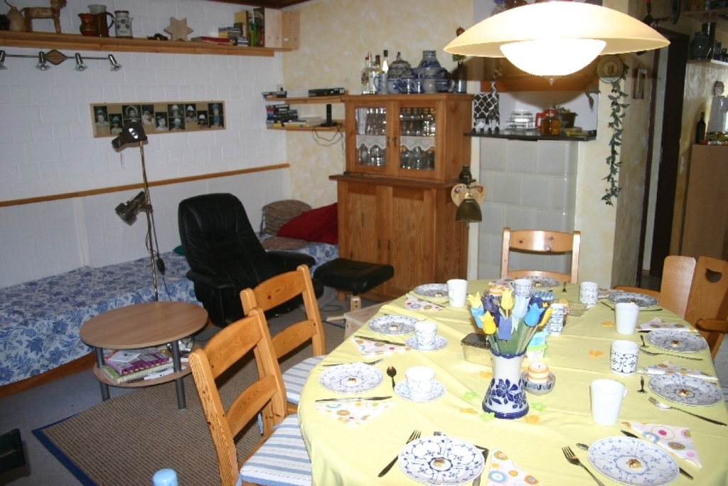 The living room with sleeping sofas / Das Wohnzimmer mit Schlafsofas