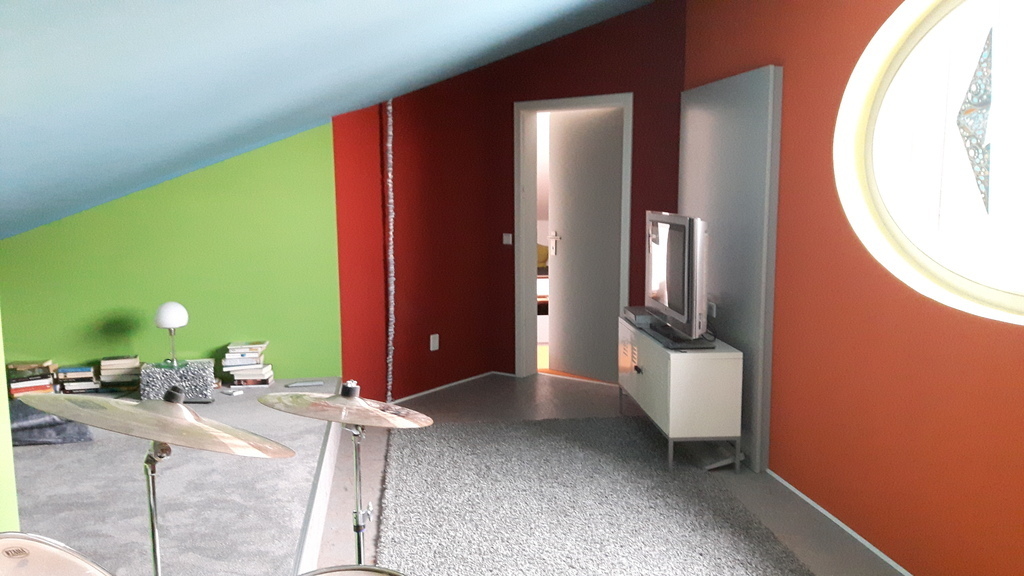 Upstairs is an extra room to chill and watch TV or movies.