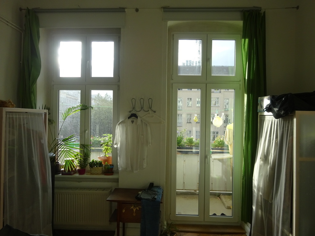 Bedroom with double bed and balkony