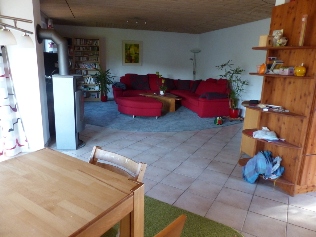 Dining and living room with  stove