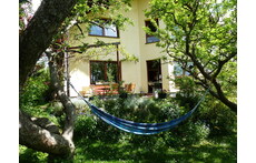 Relaxing under the apple trees or at the terrace