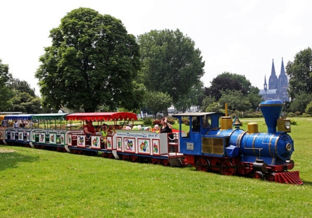 ...cross the Rheinpark by railway...