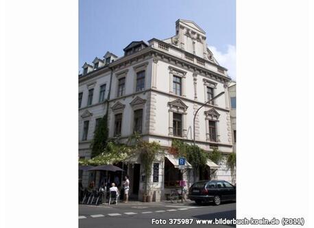 ...directly vis-á-vis of our house is a smart & charming café, where you can get...