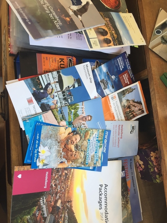 Two folders with tourist informations papers
