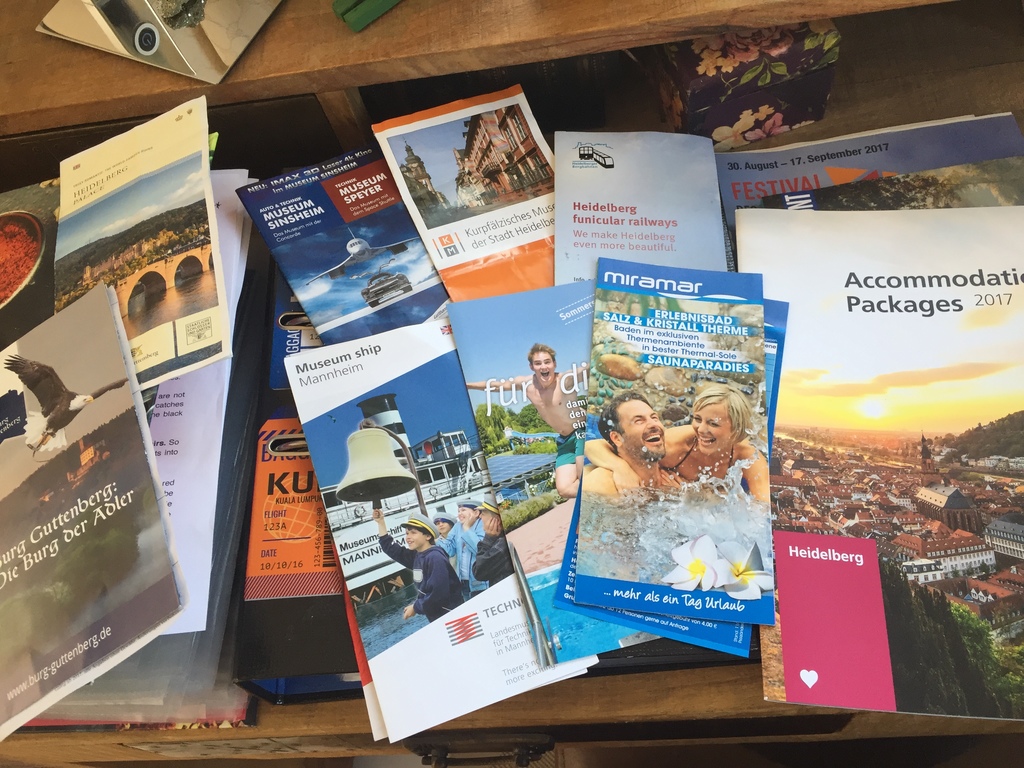 Two folders with tourist informations papers