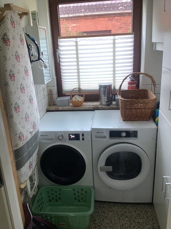 laundry room with washer and dryer