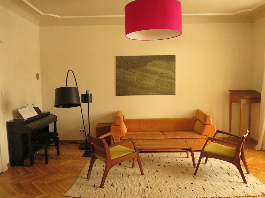 sitting room with piano