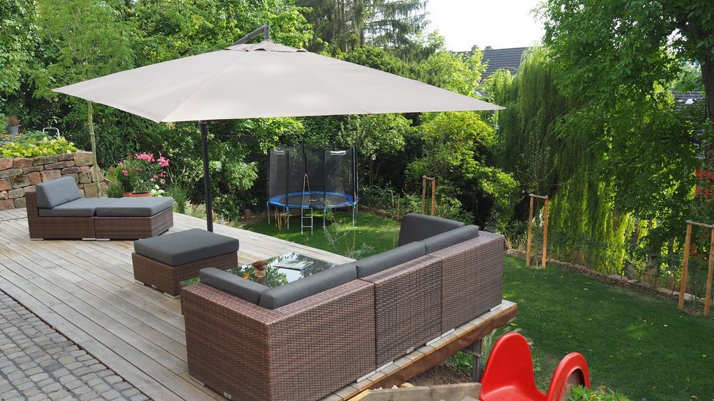 our garden: terrace, trampoline and slide