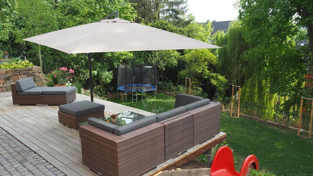 our garden: terrace, trampoline and slide