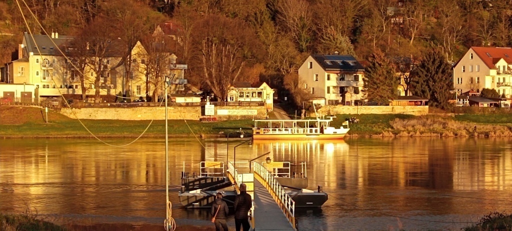 same ferry with view of the nice little restaurant on the banks of the river
