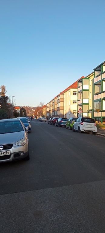 main road where you can park your car, two minutes from our flat