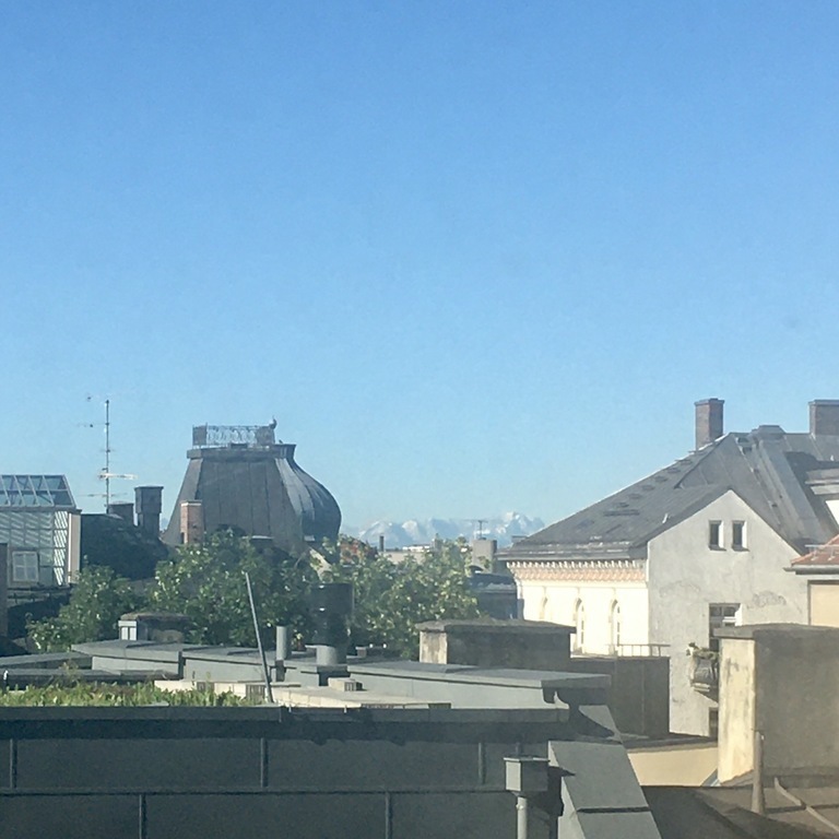 View from the upper balcony (See the Alps in the back?)