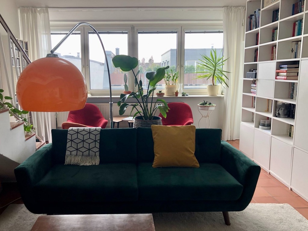 Our living room with lots of light and lots of books