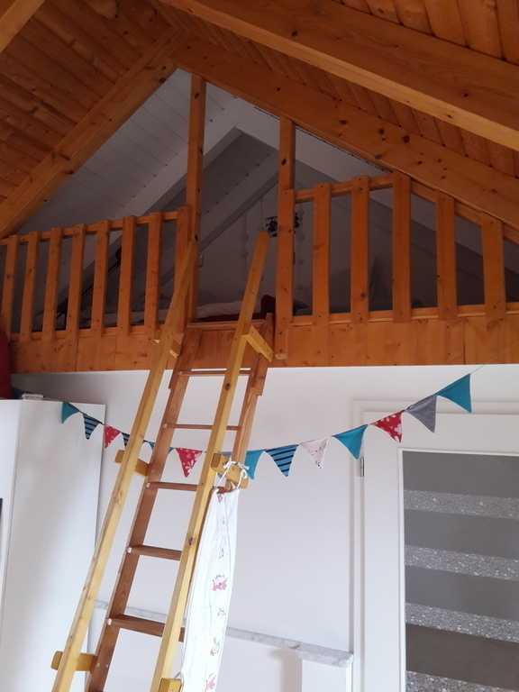 within the big room under the roof top