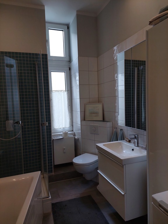 Bathroom with shower and tub