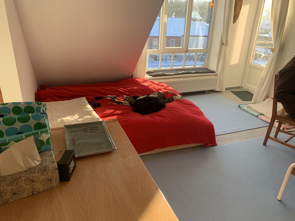 Living room with parents bed