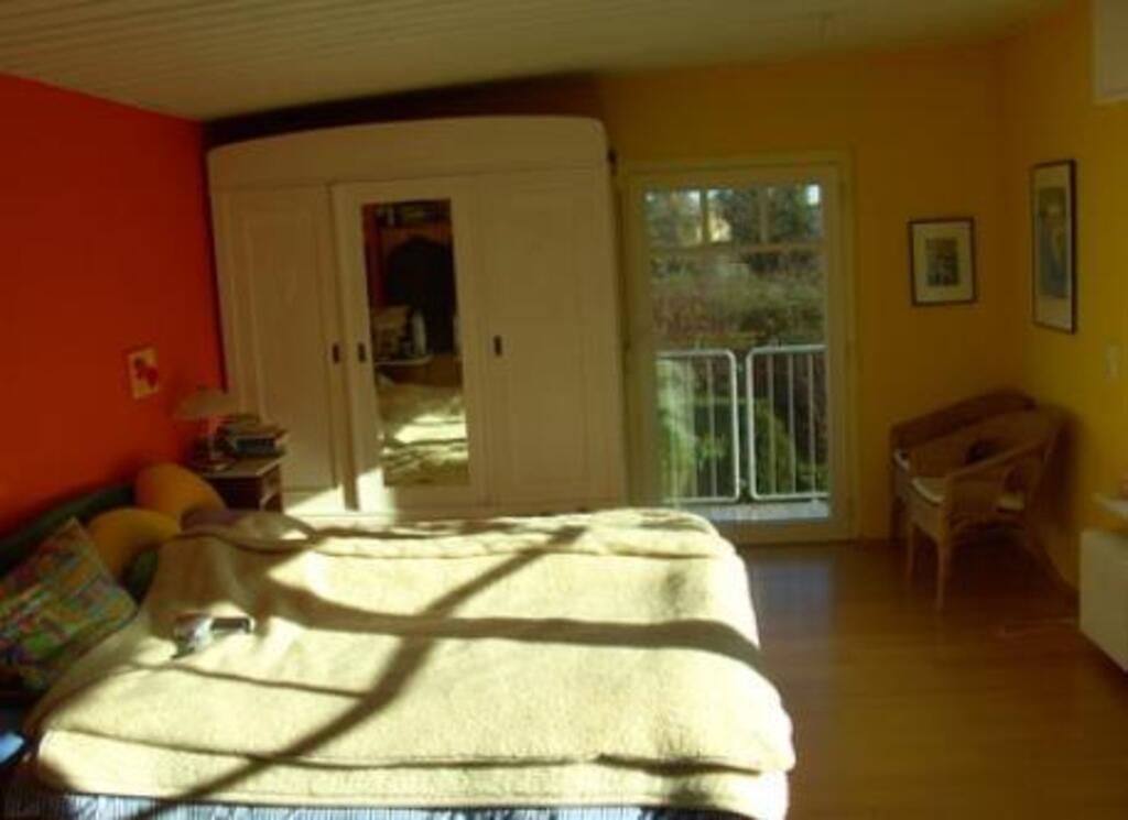 Bedroom with large balcony and gardenview
