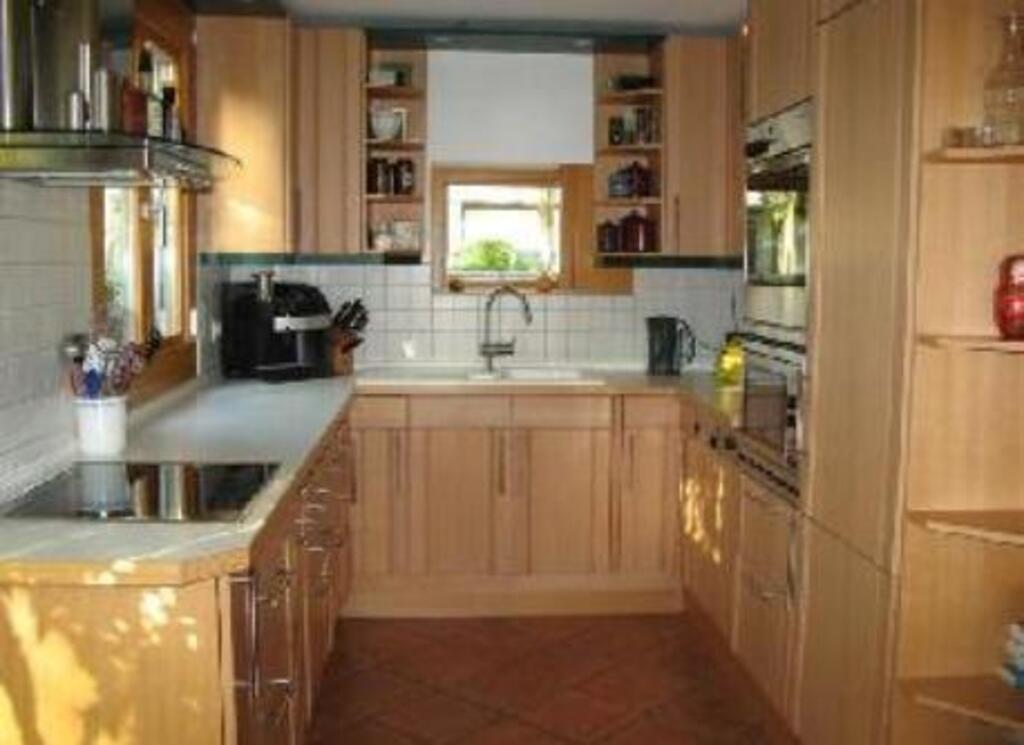 open kitchen with access to patio