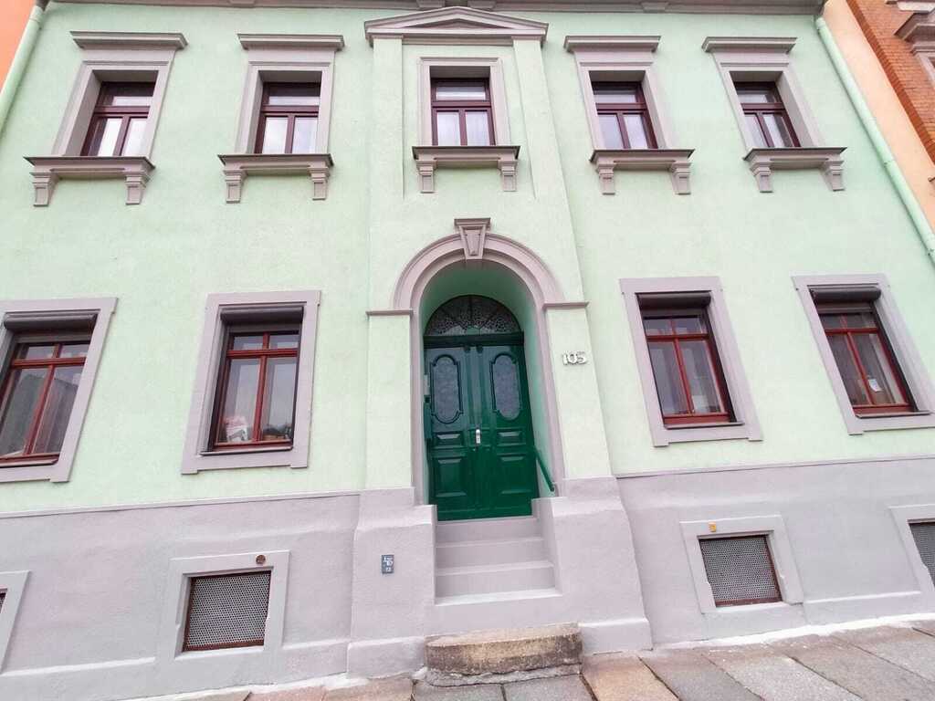 The front of our house. The entire building belongs to our family.