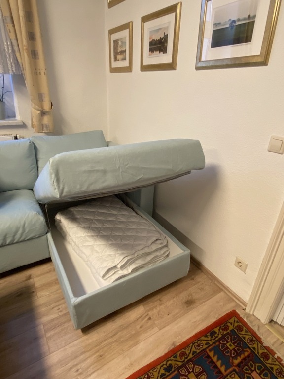 living and relaxation area. The sofa can be opened; inside is sleeping equipment.