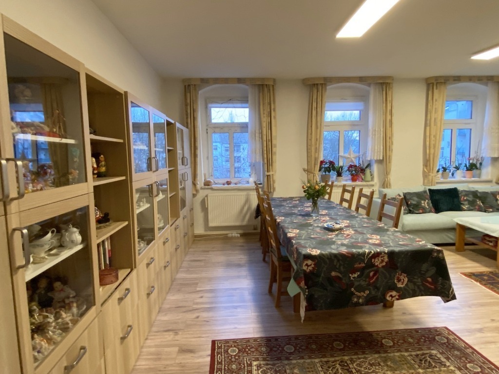 living room with dining area, TV and lounge