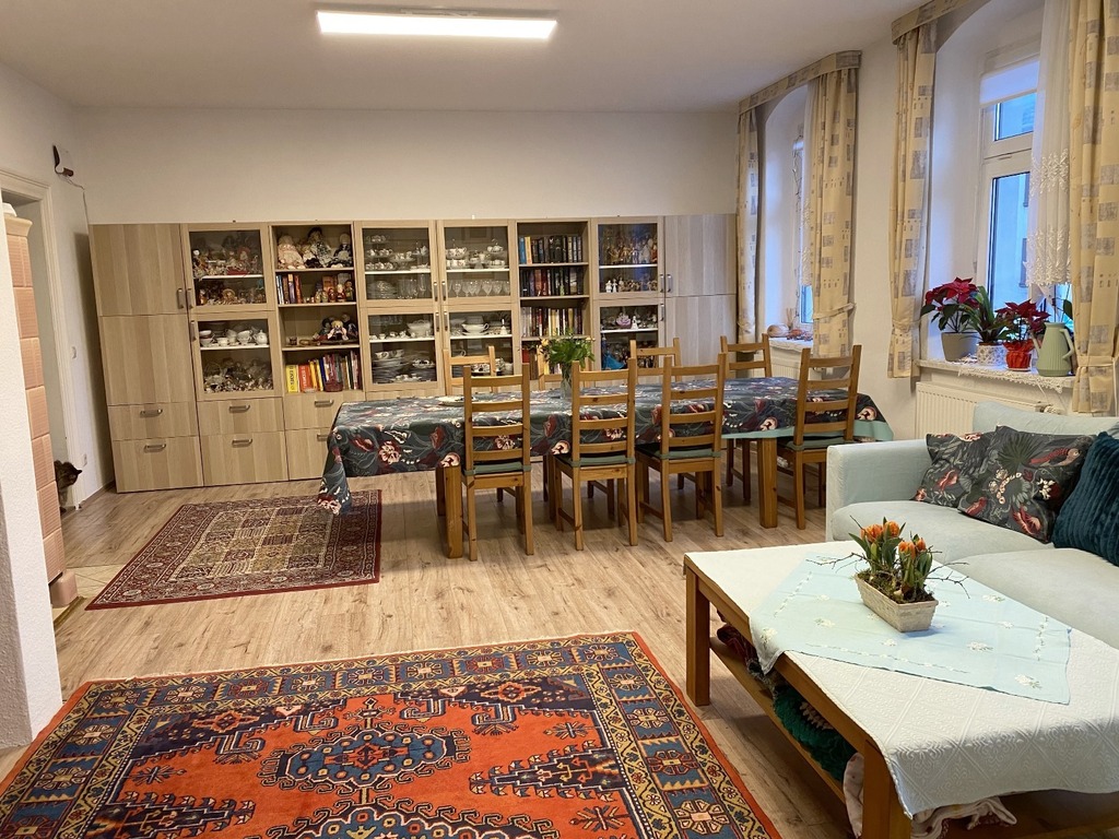 living room with dining area, TV and lounge