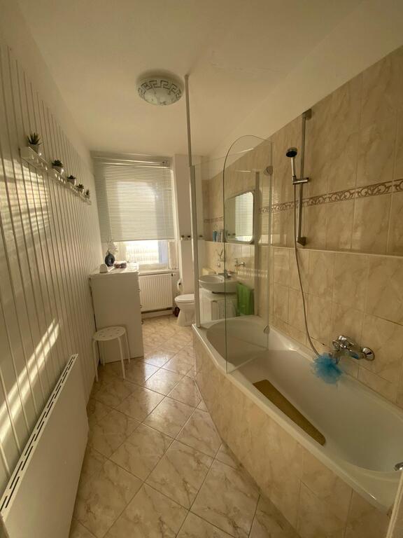 The bathroom is spacious. In addition, there is the possibility of taking a bath and also a shower.