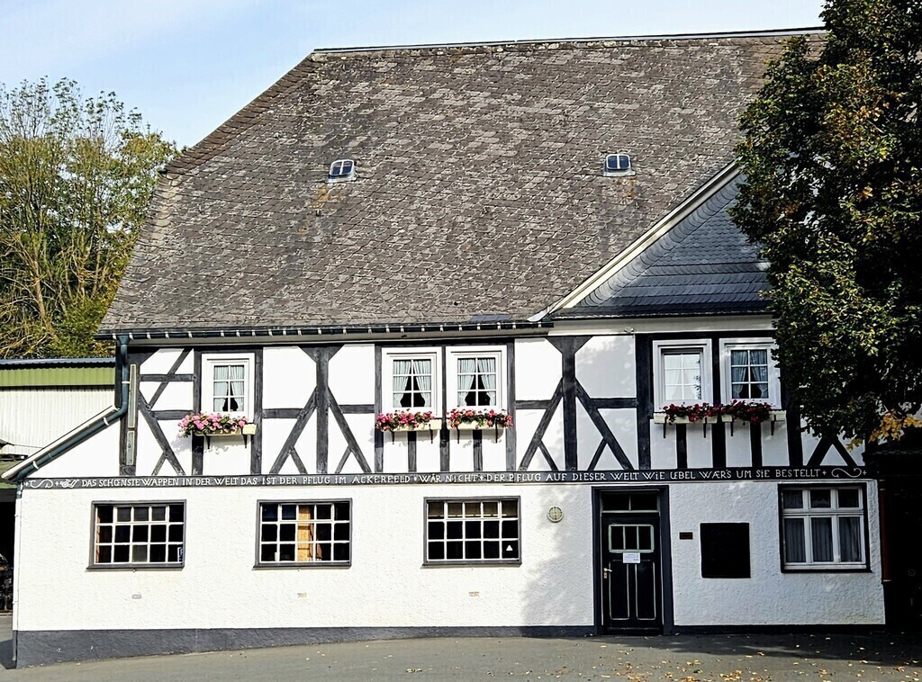 Facade of a typical half-timbered farmhouse house in Sauerland