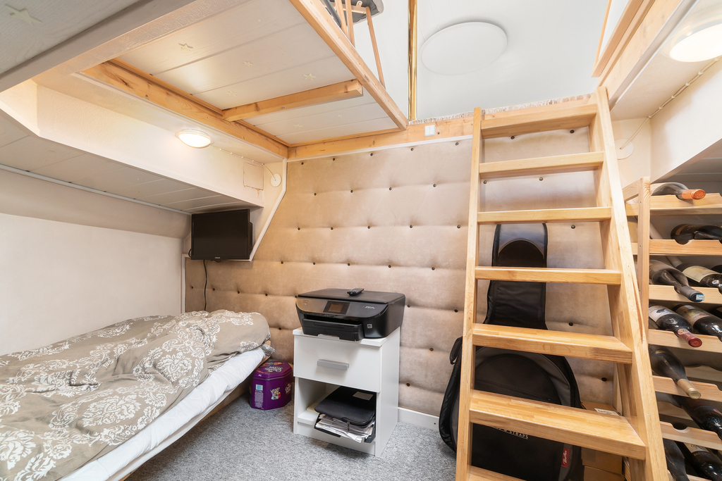 The houseboat: The cabin on board with two beds 