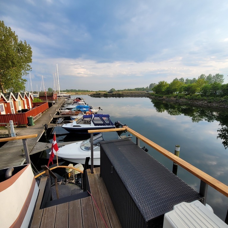 View of the cabin on land, with extra sleeping places,