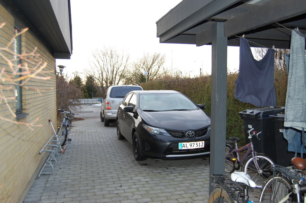 The driveway and our two cars. Both for five people.