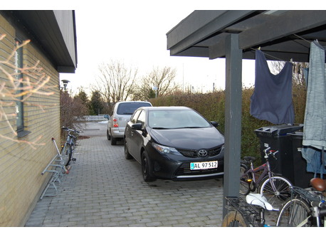 The driveway and our two cars. Both for five people.