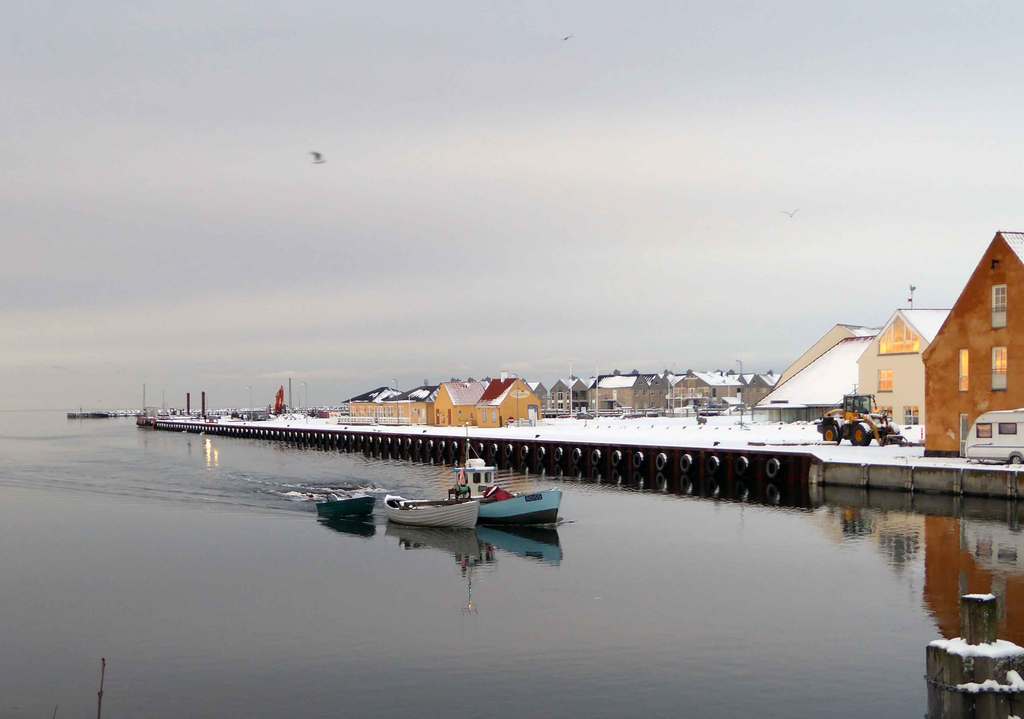 Fisherman coming home in winter