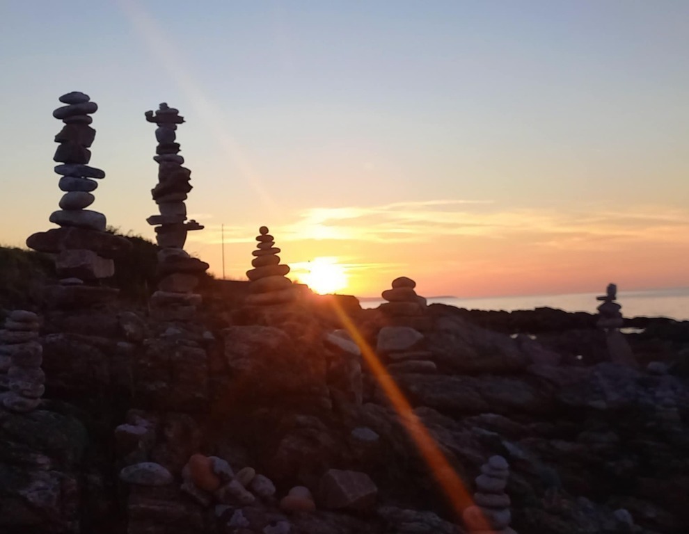 Enjoy the sunset at the Harbour in Gudhjem.