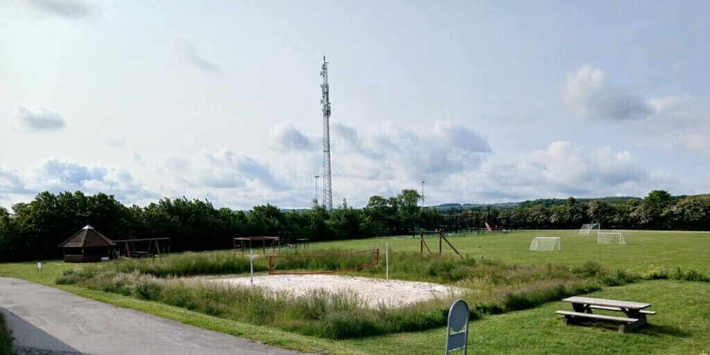 Public sportsground by Gudhjem indoor swimmingpool. 500 m away. Paddle, football, beach-volley, playground and fireplace