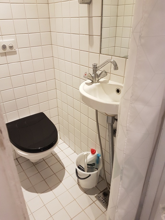 small bathroom with hot shower 