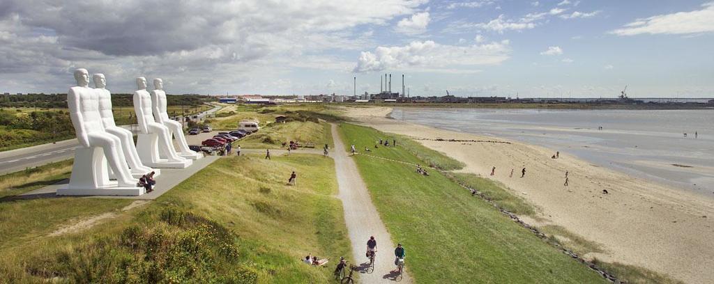 Esbjerg's landmark 'Men at sea' and a view to the harbour.