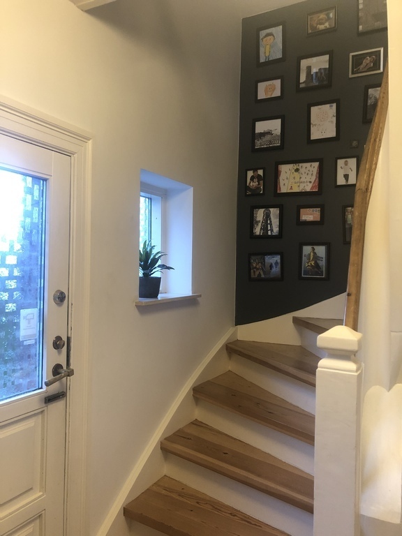Stairs to the first floor, entrance hall