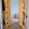 Walk though closet between the girls rooms