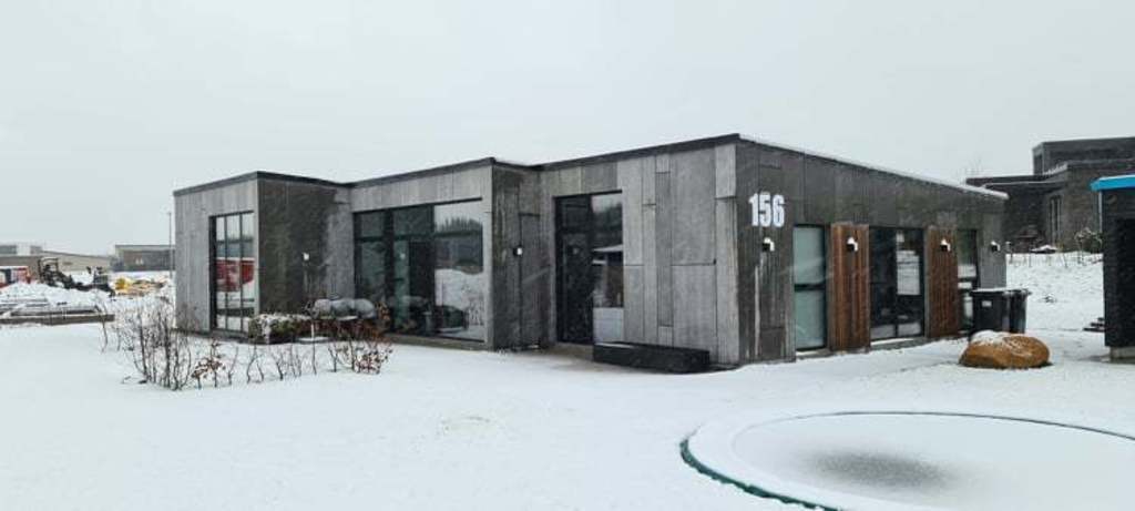 House and garden (with trampolin under the snow)