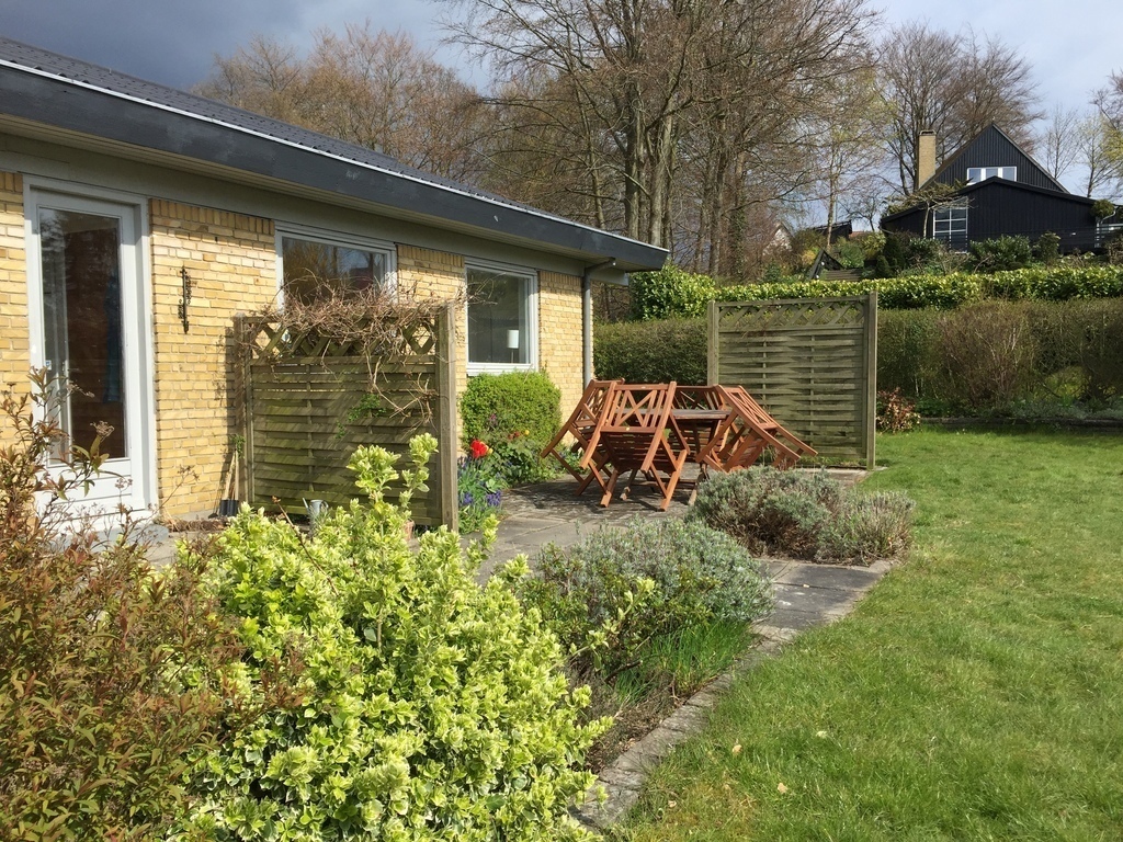 House and garden in early springtime