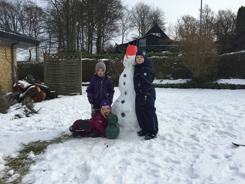 Bjørn and Rigmor (sitting) with a friend in the winter
