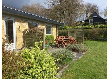 House and garden in early springtime