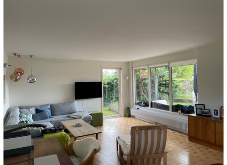 Living room looking towards front garden
