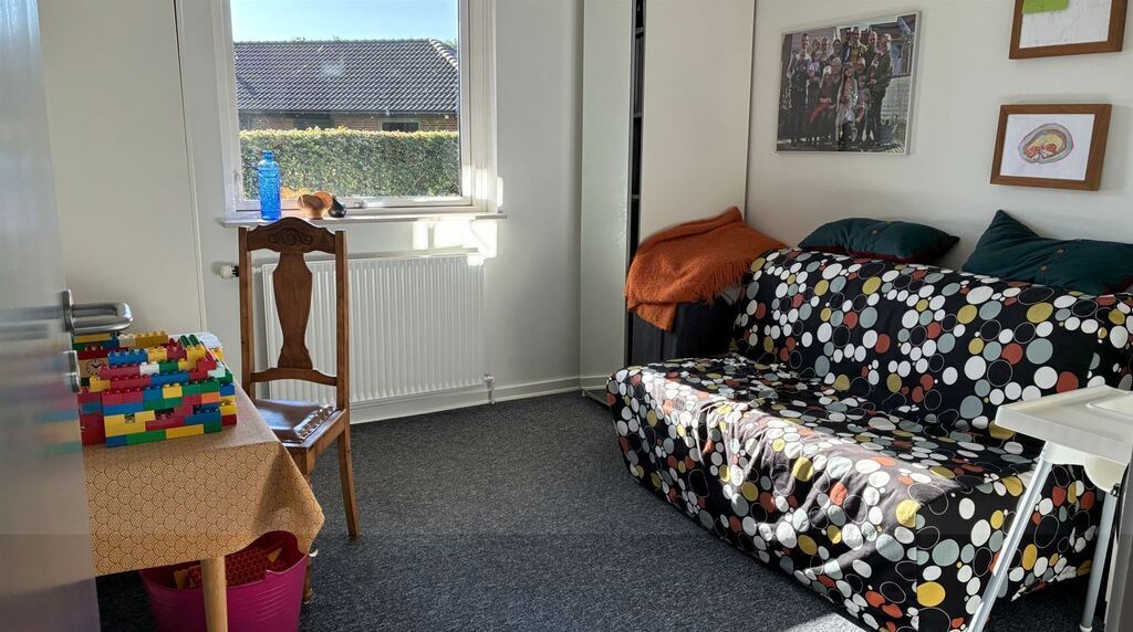 Room with futon and toys